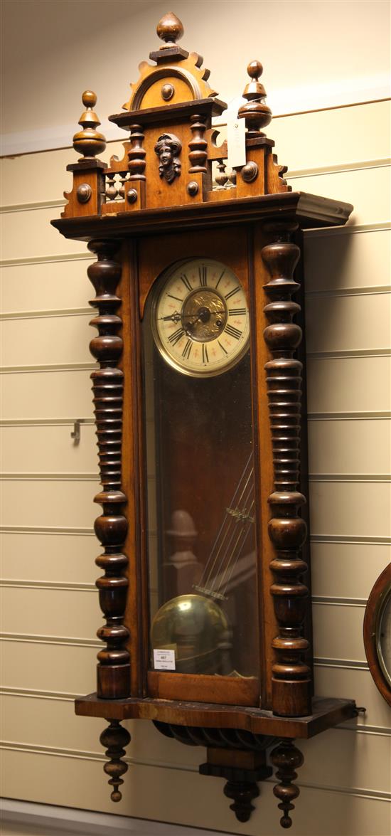 A late 19th century walnut Vienna wall clock, 50in.(-)
